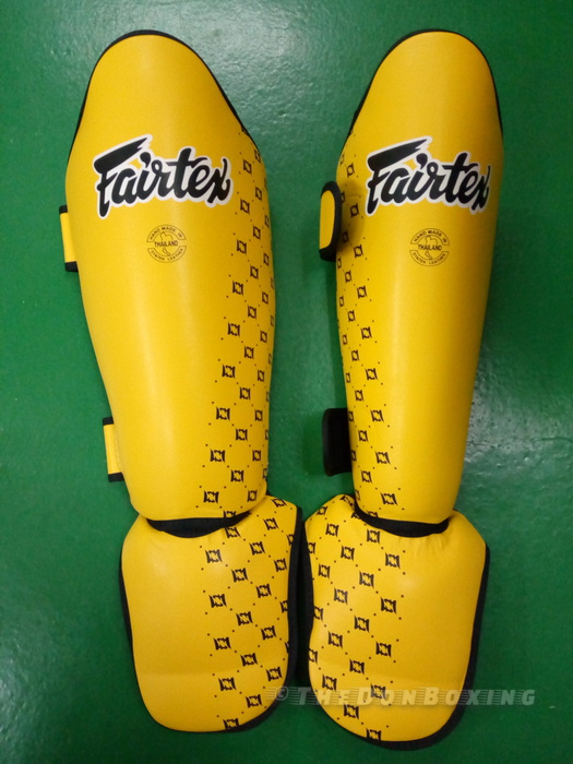 Fairtex shin guards for competition yellow black